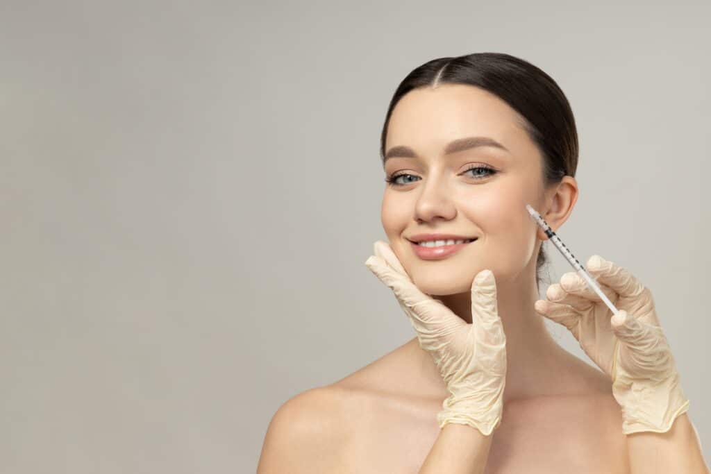 smiling woman getting Botox